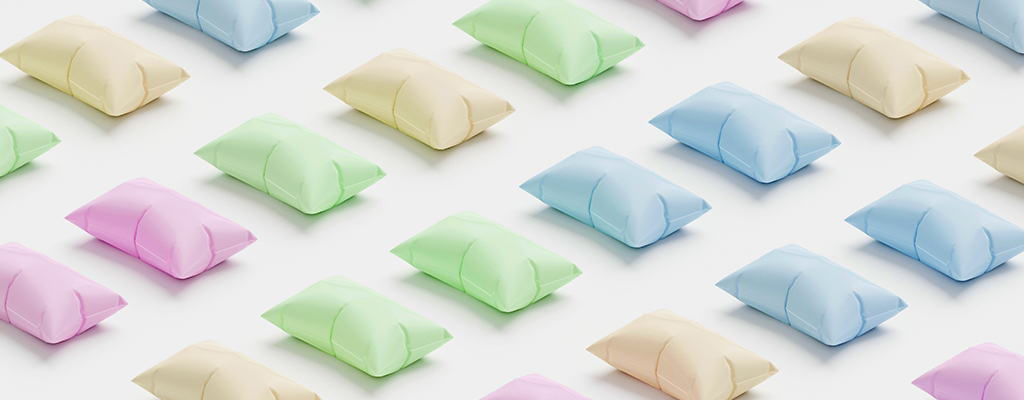 pastel blue, green, yellow, and pink pillows