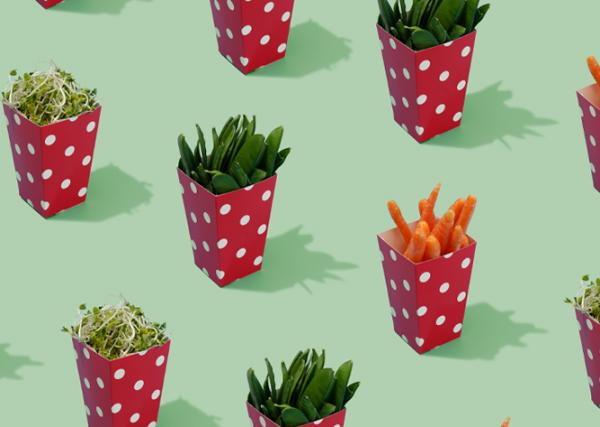 red and white polka dot containers hold healthy snacks of fresh carrots, bean sprouts, and snow peas