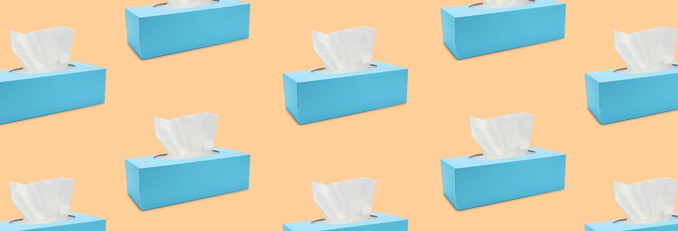 blue tissue boxes on an orange background